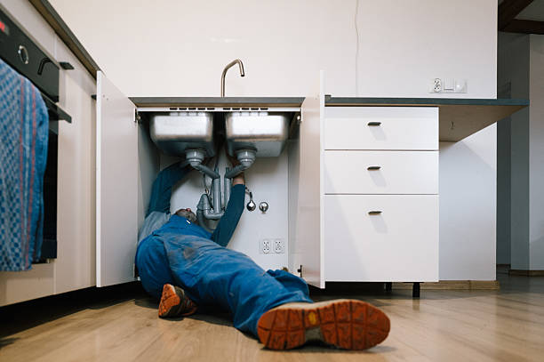 Professional Drain Cleaning technician working in Midland, MI